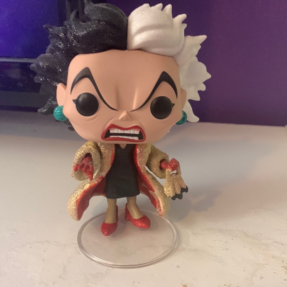 Cruella de vil Funko Pop and Killmonger POP